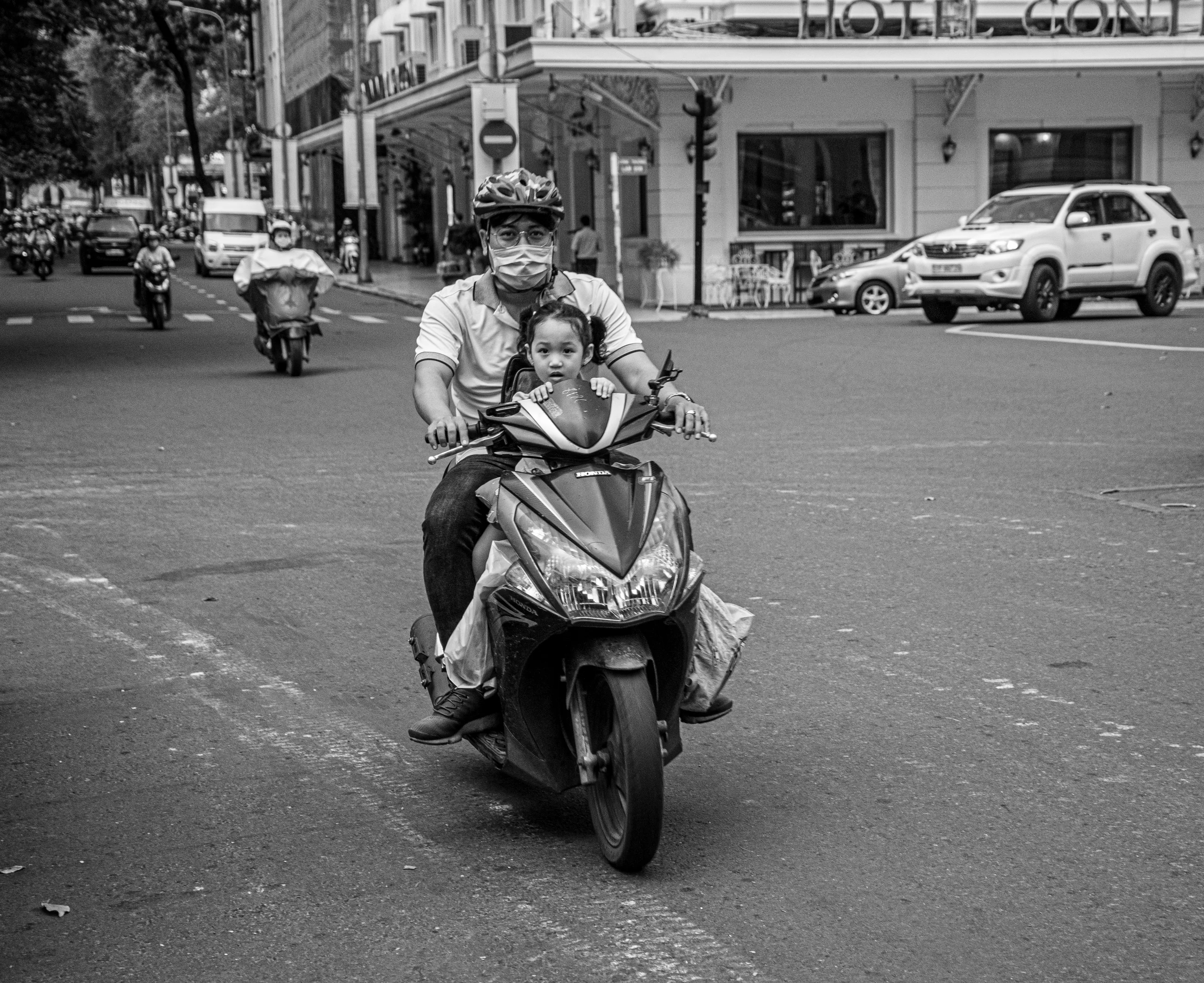 Man on bike with child